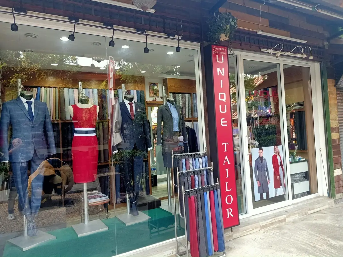 The Unique Custom Tailor shopfront in Fisherman's Village, Bophut — look for the red sign